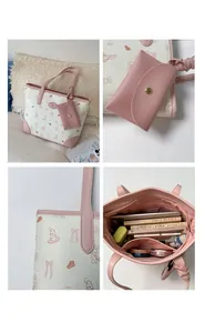 Detail view of pink cartoon bunny tote bag featuring spacious inner pockets and stitching
