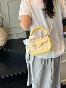 Chic yellow plaid crossbody bag with elegant lace bow detail and top handle for women