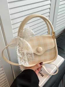 Chic cream checkered handbag with lace bow detail and crossbody strap for women