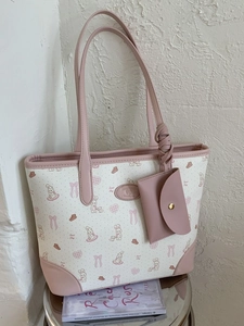Chic cream tote bag with pink bow prints and cute bunny patterns including a small coin purse