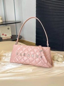 Pink quilted leather crossbody bag with metal chain strap and decorative letters