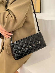 Chic black quilted crossbody bag with metal chain strap and luxury letter decoration