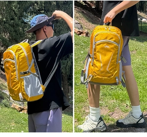 Outdoor yellow hiking backpack detail showing breathable mesh straps and nylon fabric