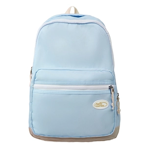 Minimalist light blue waterproof backpack with front zipper pocket and reinforced base