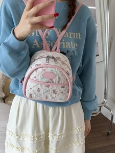 Mini white patterned backpack with pink leather straps and cute cartoon bear prints