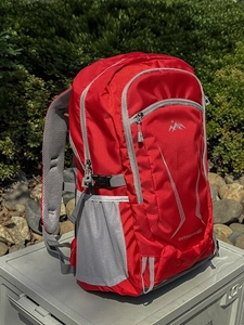 Waterproof red 40L outdoor hiking backpack with breathable straps and side mesh pockets