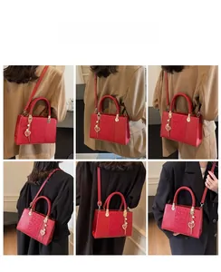 Detailed views of red bridal handbag featuring floral embossing and gold heart pendant
