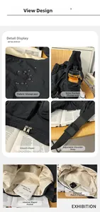 Detail view of black waterproof nylon messenger bag with smooth zippers and side pockets