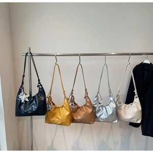 Five pleated hobo bags with star pendants in black, yellow, brown, silver and cream colors