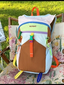Outdoor leisure backpack with colorful patchwork design and lightweight nylon fabric