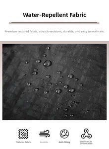 Close-up of waterproof black fabric with water droplets on a large outdoor backpack