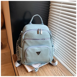Light blue PU leather backpack with textured weave pattern and adjustable strap