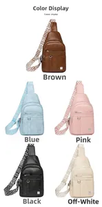 Five stylish crossbody bags in various colors featuring geometric wave pattern wide straps