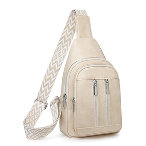 Detail of beige crossbody chest bag with jacquard strap and multi-zipper pockets