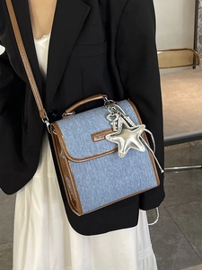 Retro denim shoulder bag with brown leather trim and silver star pendant for women