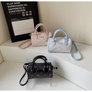 Detailed comparison of pink, blue, and black Boston bags with deer print and metal logo