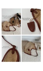 Detail of woven straw bucket bag showing reinforced leather handle and decorative charm
