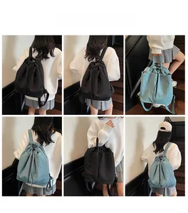 Detail of minimalist waterproof drawstring bag showing two-way carry modes and side pockets