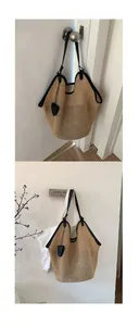 Detail of beige woven mesh tote bag featuring black leather shoulder straps and contrast trim