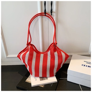 Close-up of red and white striped mesh tote bag with double top handles for women