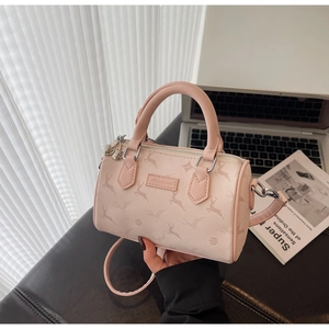 Detailed close-up of a pink Boston bag with artistic deer print and silver metal zippers