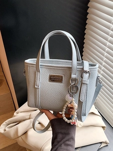 Borsa a Secchiello da Donna in Pelle PU con Trama Litchi Minimalista Casual a Tracolla Con Pendaglio di Künstliche Perle e Cartoni Animati