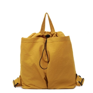 Versatile bright yellow drawstring handbag and shoulder bag in durable nylon material