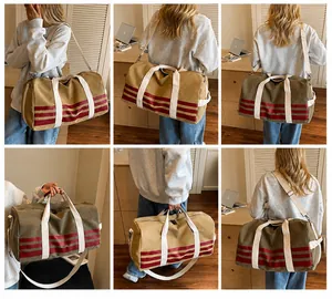 Multiple views of large canvas travel duffel bag with red stripes and shoulder strap