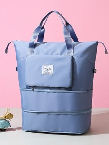 Light blue water-resistant travel bag with multi-layer zippers and spacious interior design