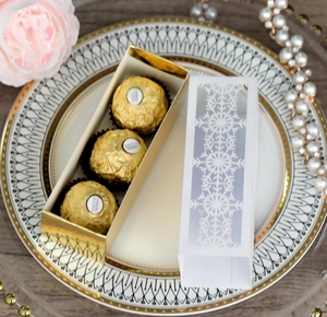Detailed laser-cut snowflake candy box with elegant gold lining for Christmas gifts