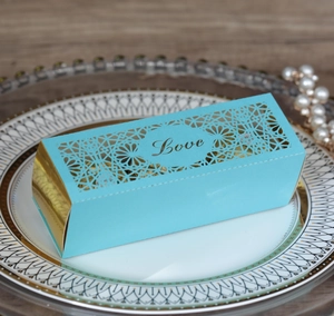 Sky blue and gold hollow LOVE candy box with floral laser cut design for wedding favors