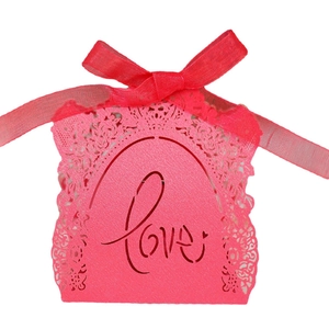 Pink laser-cut Love candy box with red ribbon for wedding and Valentine's Day favors