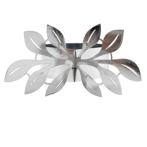 Macro view of symmetrical hollow leaf silver metal napkin ring with polished finish