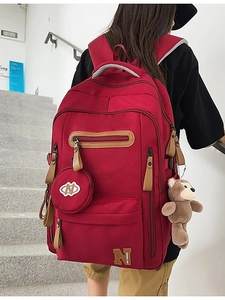 Japanese style deep red backpack with large capacity and cute bear keychain accessory