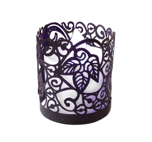 Detailed laser-cut vine patterns on black cylindrical LED candle paper lampshade