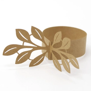 Elegant laser-cut kraft paper napkin ring with leaf pattern for table decoration