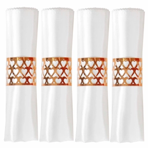 Set of four rose gold heart hollow napkin rings with elegant white fabric napkins