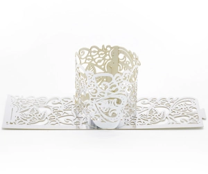 Detailed laser-cut hollow heart pattern on pearlescent white paper candle shade wraps