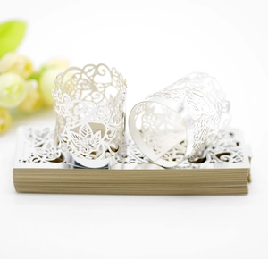 Laser cut leaf pattern silver paper lampshade for LED candle shown flat and assembled