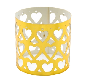 Detail showing shiny gold hollow heart pattern napkin ring for wedding table decor