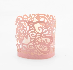 Detailed laser cut pink heart paper candle wrap for elegant party lighting decorations