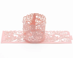 Pink laser-cut lace paper ring with floral hollow patterns for cake borders and napkins