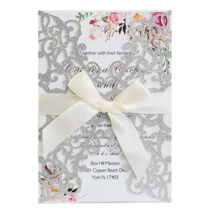 Laser cut glitter wedding invitation with white satin ribbon and floral insert card