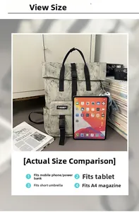 Spacious interior of a marble pattern backpack shown with a tablet and A4 magazines