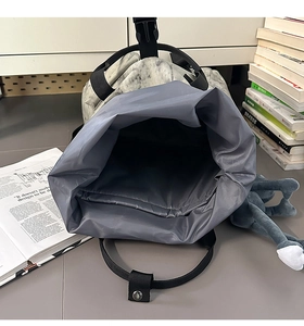 Close-up of marble texture backpack interior featuring spacious padded laptop compartment