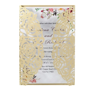 Close-up of laser-cut rose hollow invitation with elegant gold metallic finish