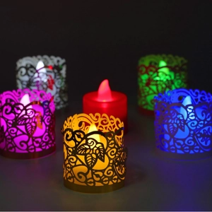 Set of 6 colorful LED tea lights with intricate hollowed vine pattern paper covers