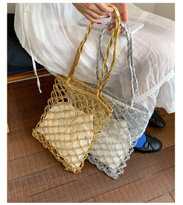 Close-up of metallic woven mesh tote bags with drawstring liners in gold and silver