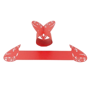 Laser cut red paper napkin rings with hollow butterfly wing patterns for weddings