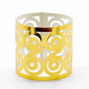 Golden hollowed-out paper napkin rings with elegant scroll geometric patterns for weddings